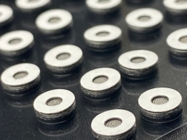Spider Acoustic ePTFE Vents for Portable Electronics Sound Protection
